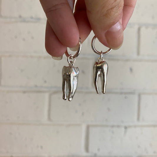 Extraction Earrings.