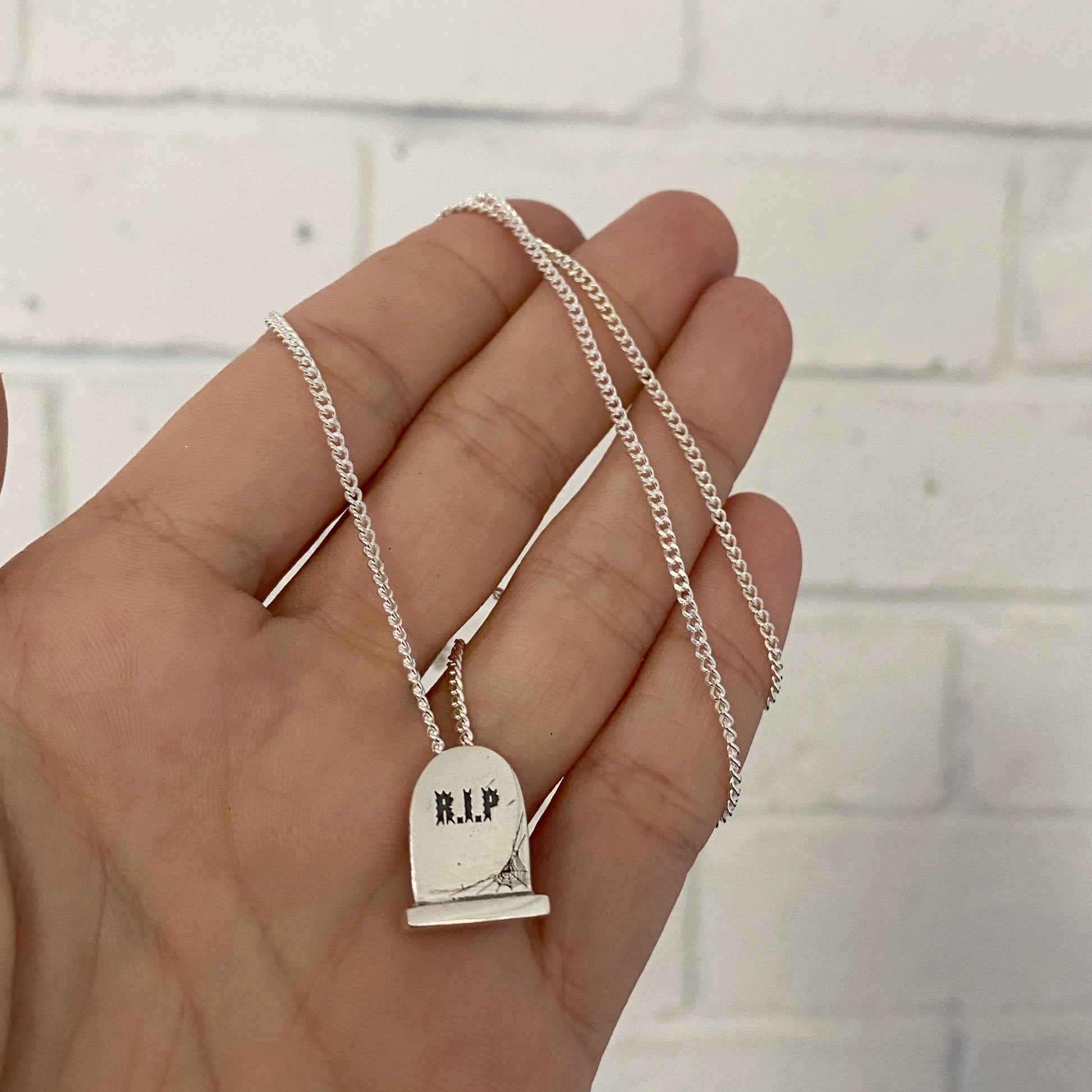 Headstone Necklace.