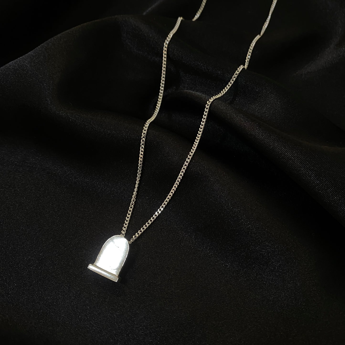 Headstone Necklace.