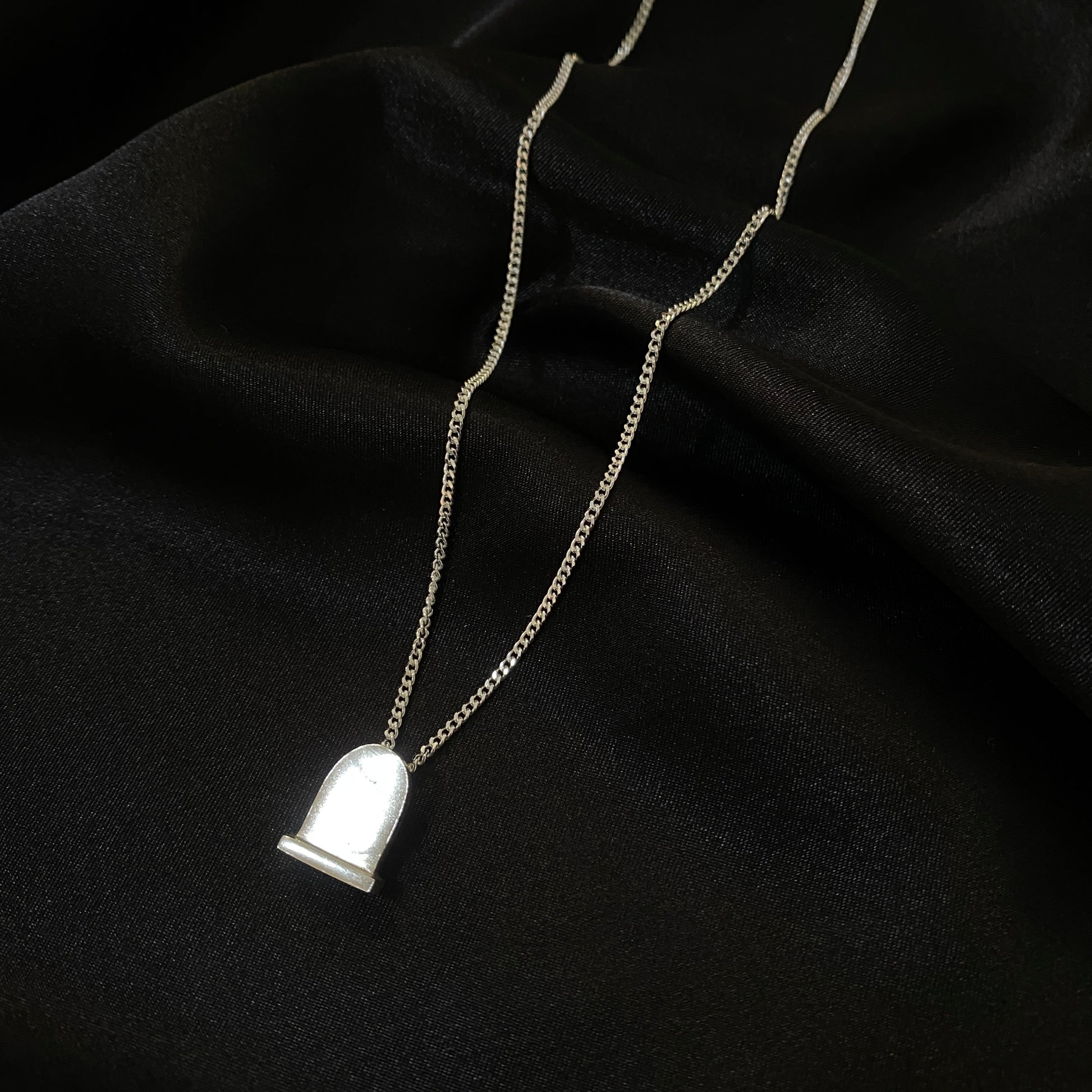 Headstone Necklace.