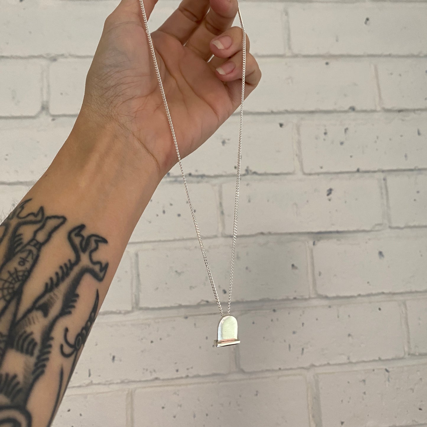 Headstone Necklace.