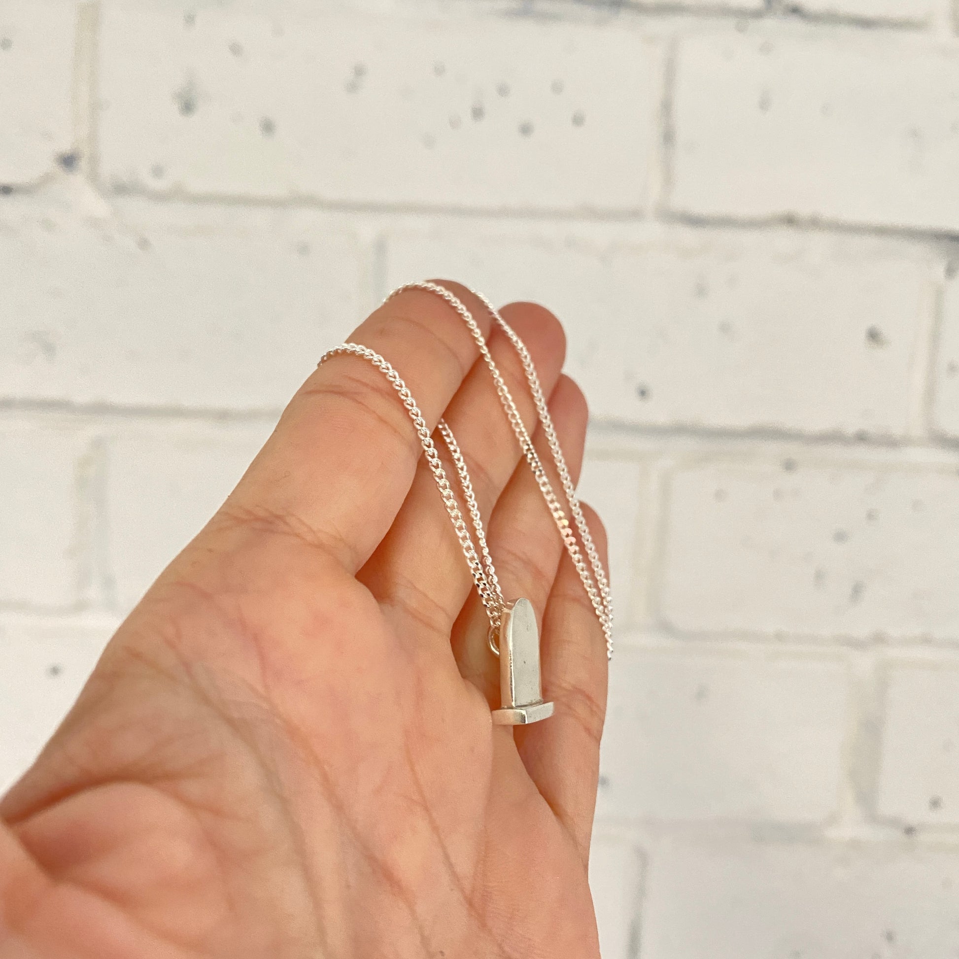 Headstone Necklace.
