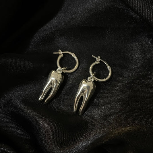 Extraction Earrings.